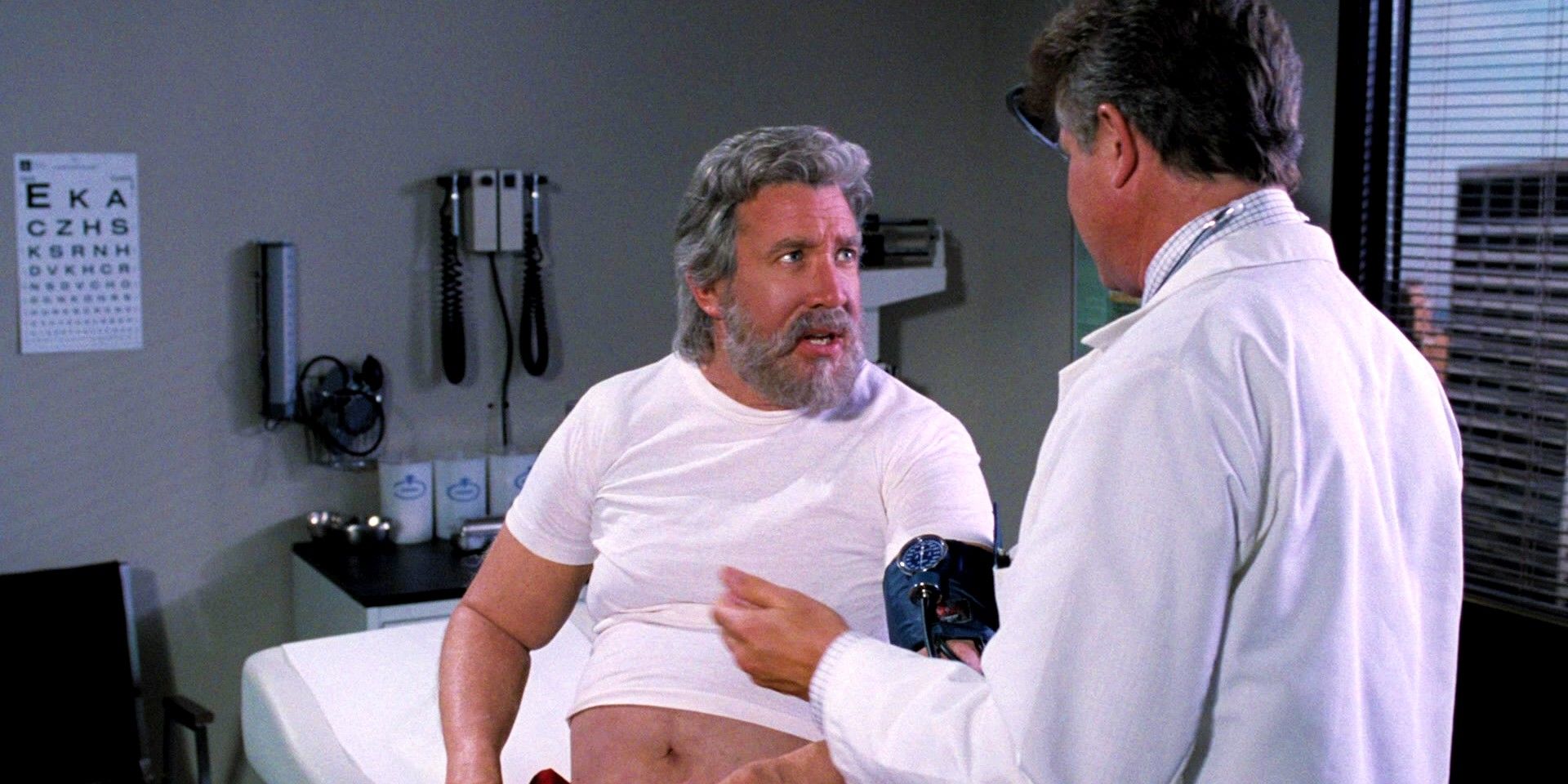 Tim Allen's Scott Calvin gets checked by a doctor in The Santa Clause
