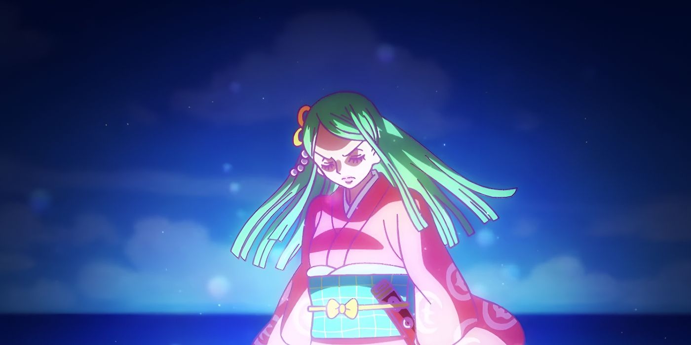 A woman with green hair and pink clothing closes her eyes in focus.