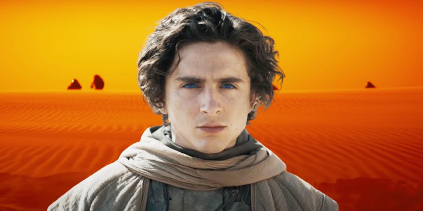 Timothée Chalamet as Paul Atreides standing in front of an orange desert background with figures emerging from behind the dunes in Dune: Part Two.