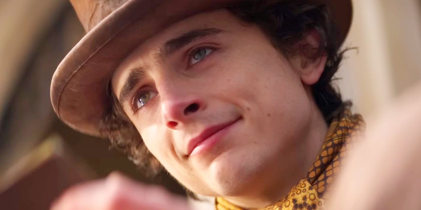 Timothee Chalamet as Willy with Tears in His Eyes While Breaking a Bar of Chocolate in Wonka