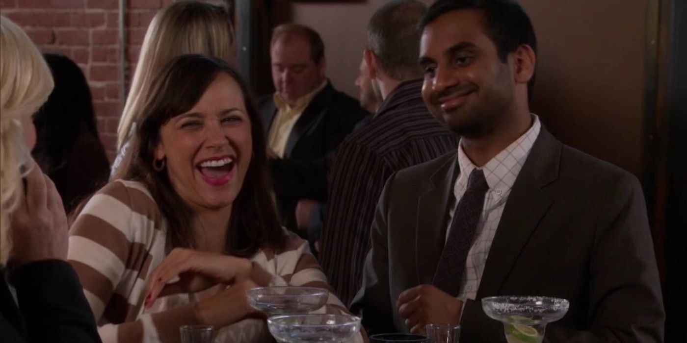 Tom and Ann laughing together in Parks and Recreation