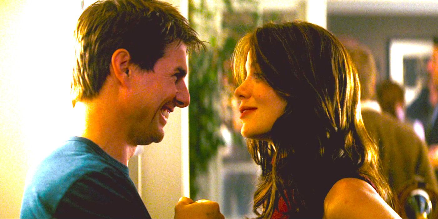 Tom Cruise and Michelle Monaghan share a light-hearted moment during a party scene from Mission: Impossible 3