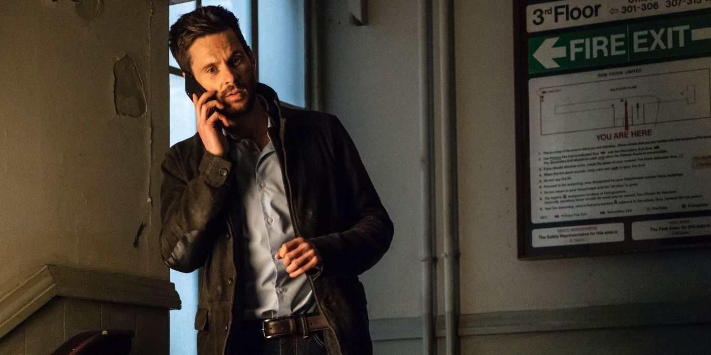 Tom Riley as Staffe reacting to a phone call from his sister in Dark Heart.