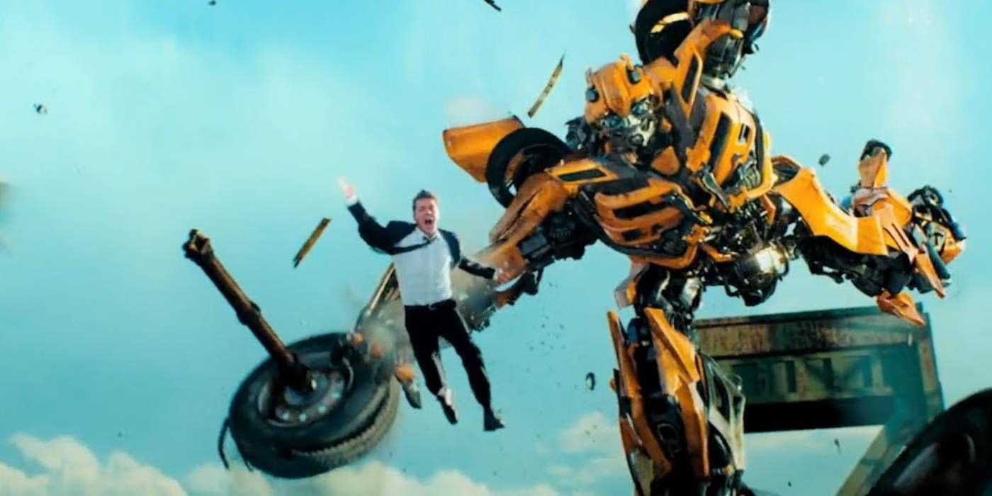 Sam (Shia Labeouf) and robot Bumblebee in the air in Transformers Dark of the Moon