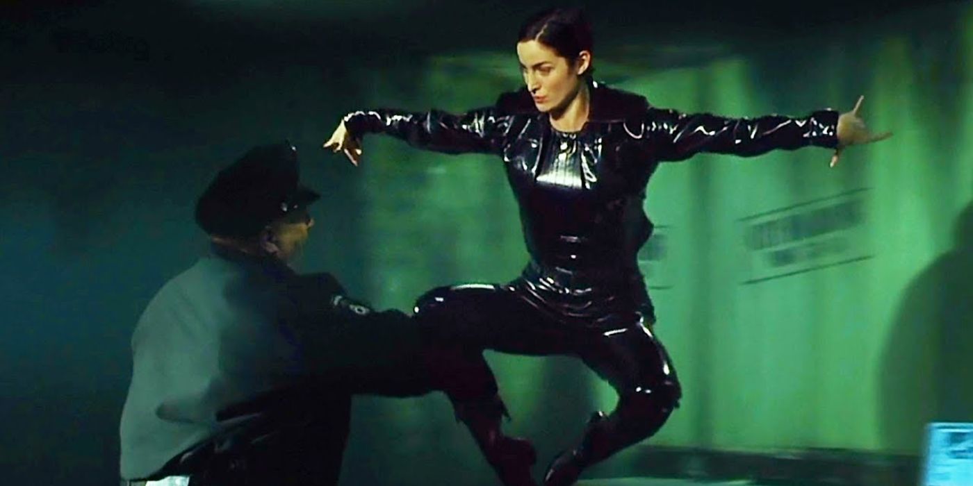 Trinity fighting a cop in The Matrix