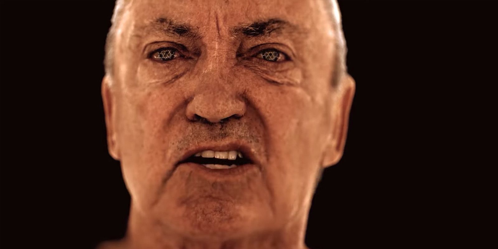 Actor Udo Kier looking directly at the camera while speaking in the trailer for Kojima’s OD.