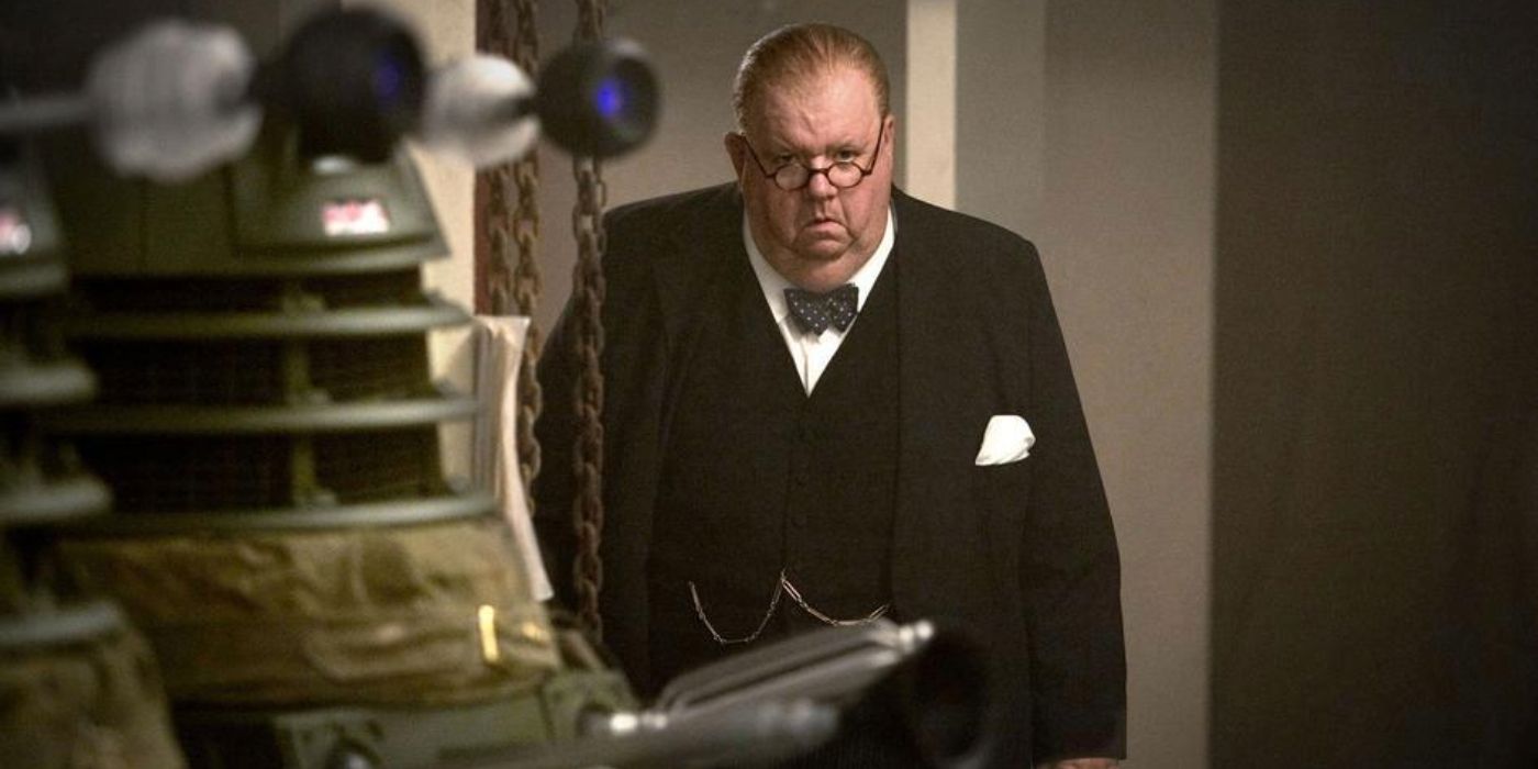 Prime Minister Winston Churchill entering a room with Daleks in in Doctor Who