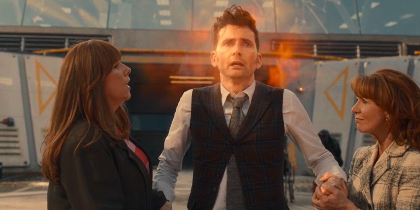 Donna Noble and Mel Bush hold the Fourteenth Doctor's hands as he regenerates in Doctor Who's "The Giggle"