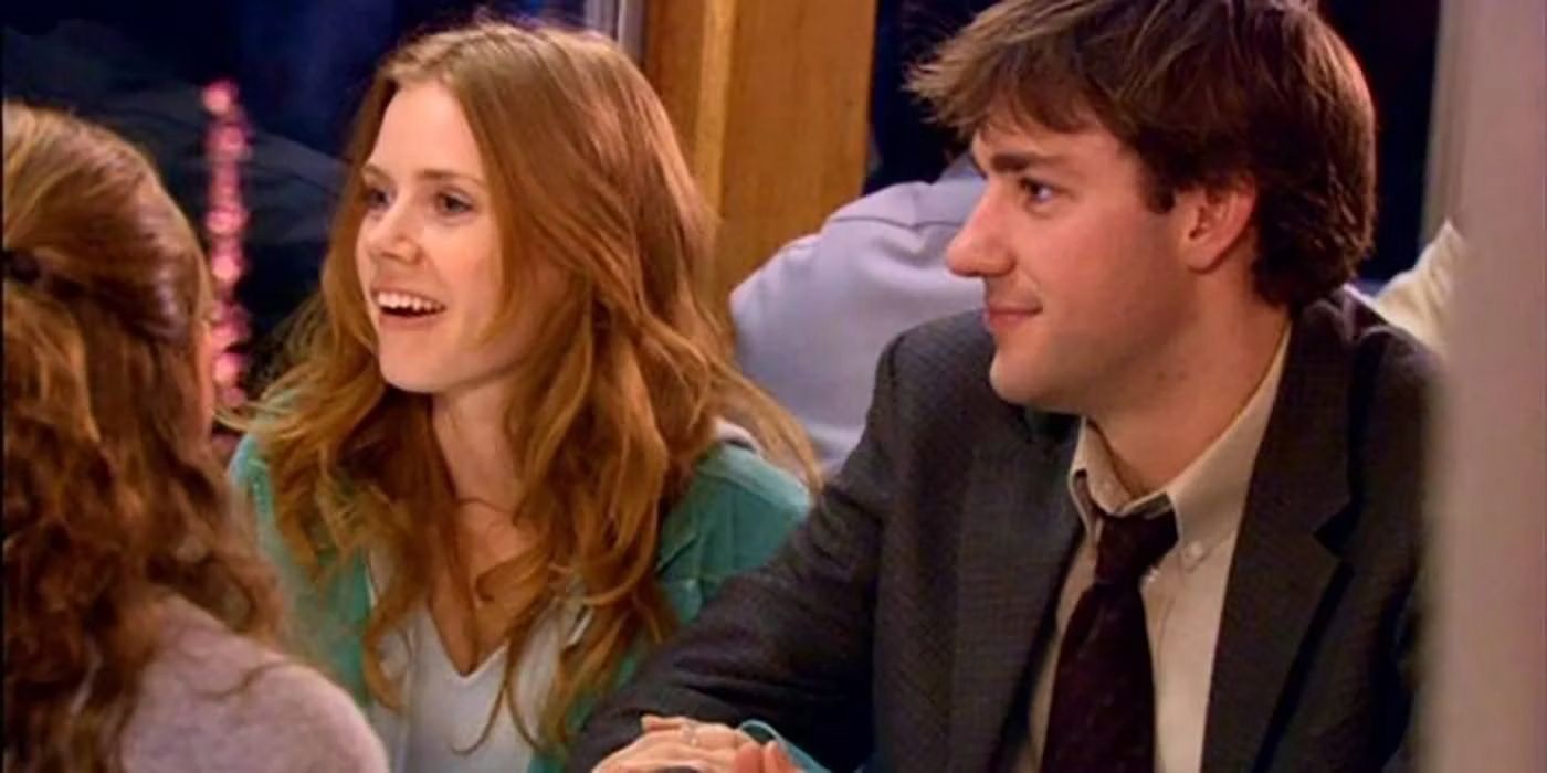 John Krasinski as Jim Halpert and Amy Adams as Katy on a boat in The Office episode "Booze Cruise"