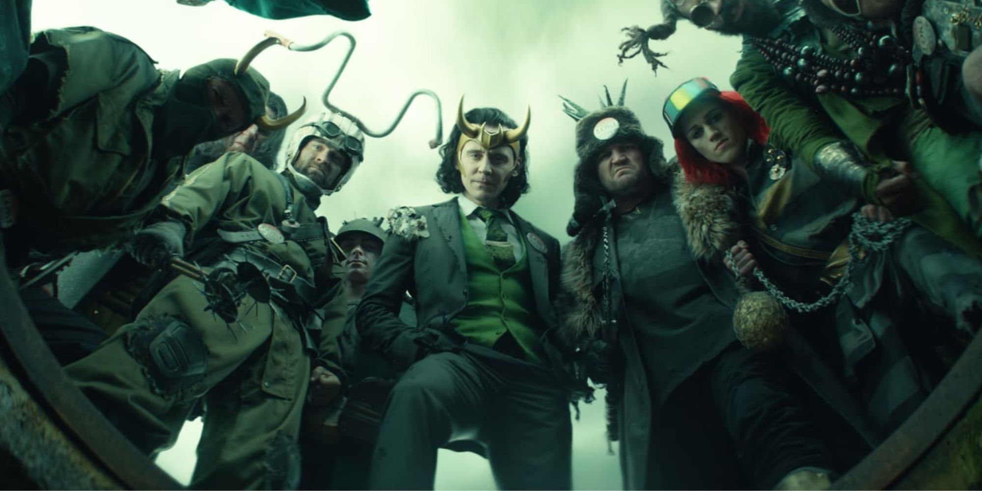 Tom Hiddleston as Loki, surrounded by other characters from the Void in Loki