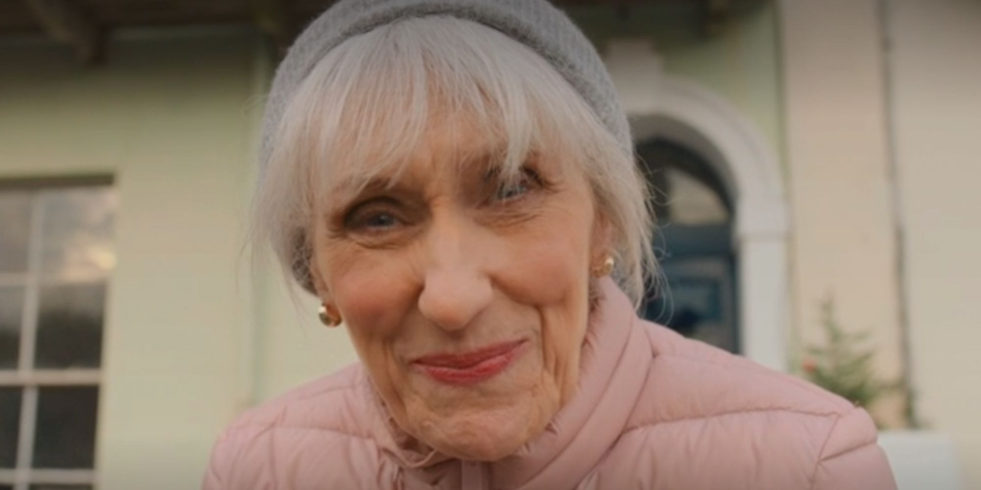 Anita Dobson smiling as Mrs. Flood in Doctor Who.