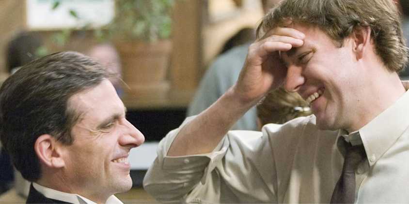 Steve Carell as Michael Scott laughing with John Krasinski as Jim Halpert in The Office