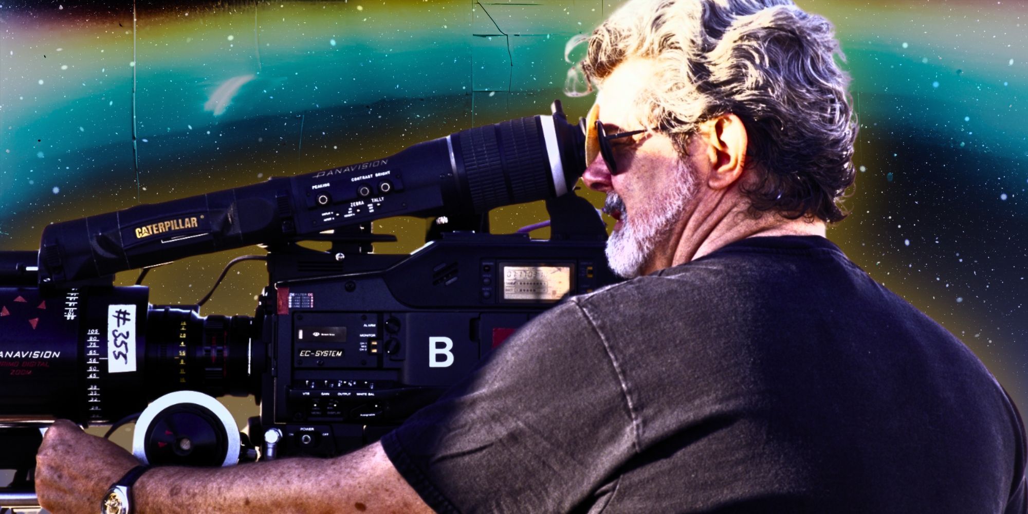 George Lucas holding a film camera