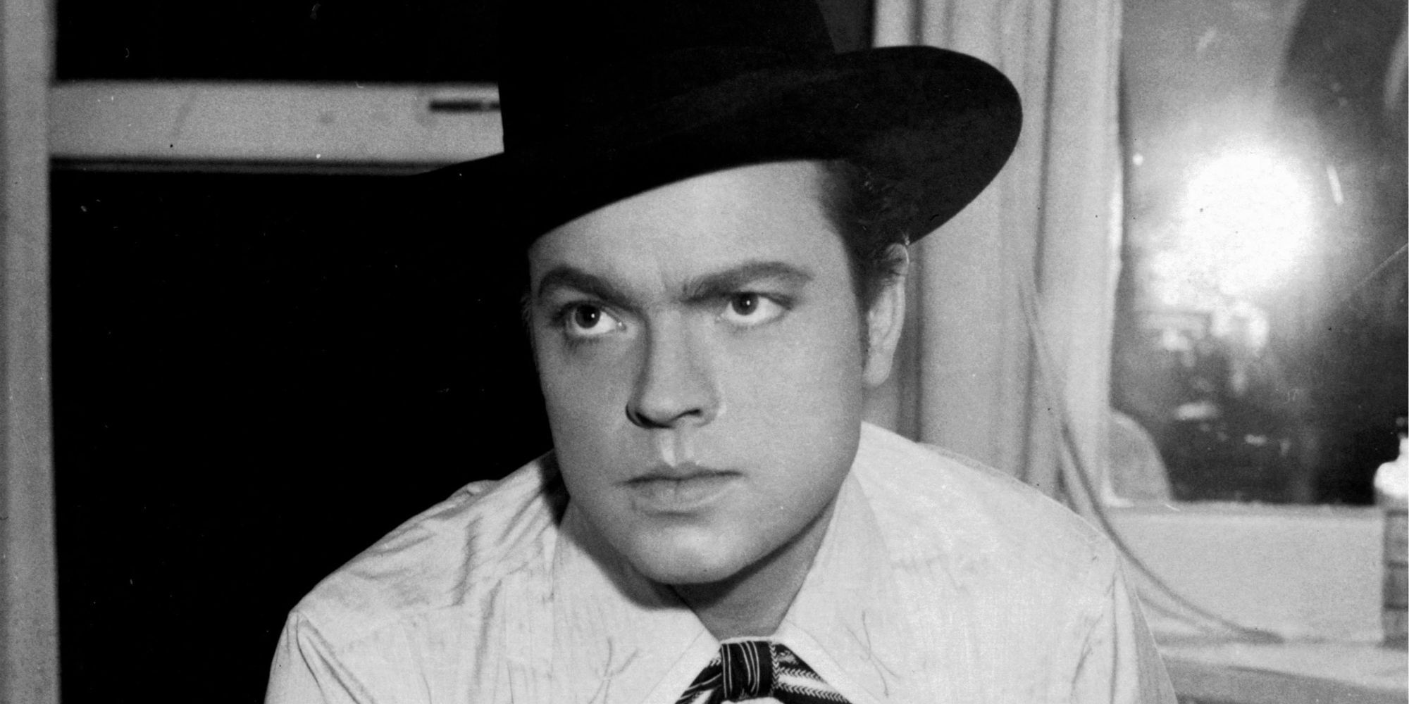 Orson Welles wearing a hat in one of his acting roles