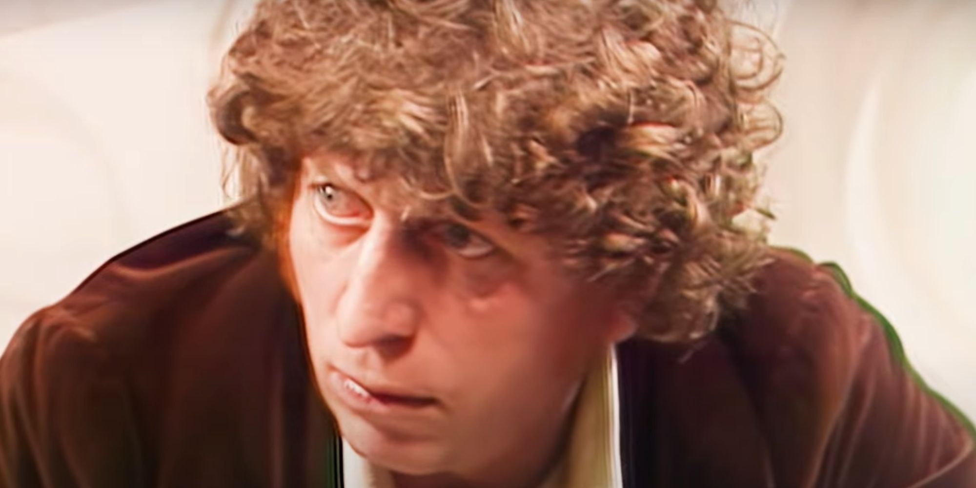 Tom Baker's Fourth Doctor looking surprised