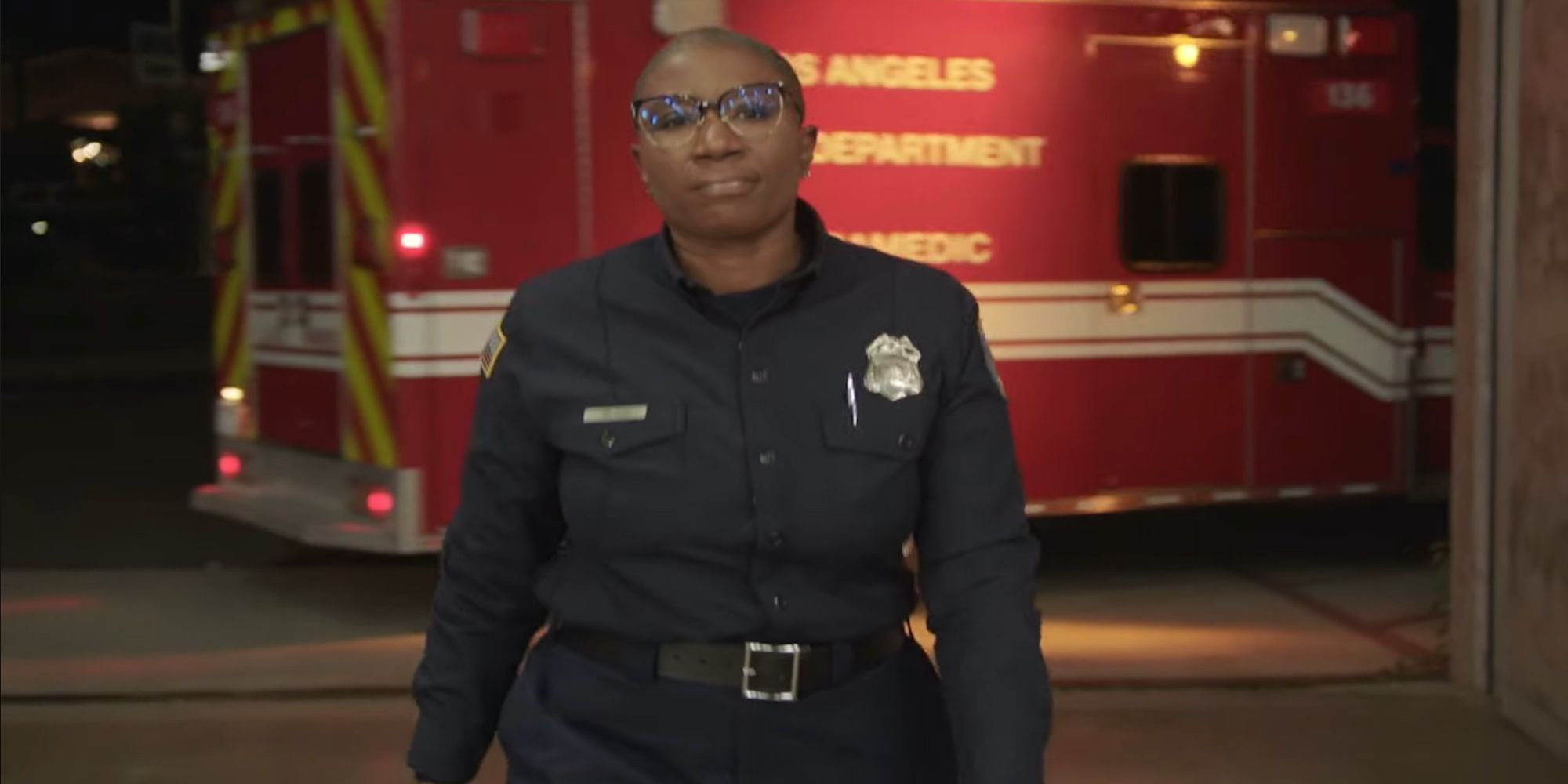 Henrietta walks through the firehouse in 9-1-1 season 7