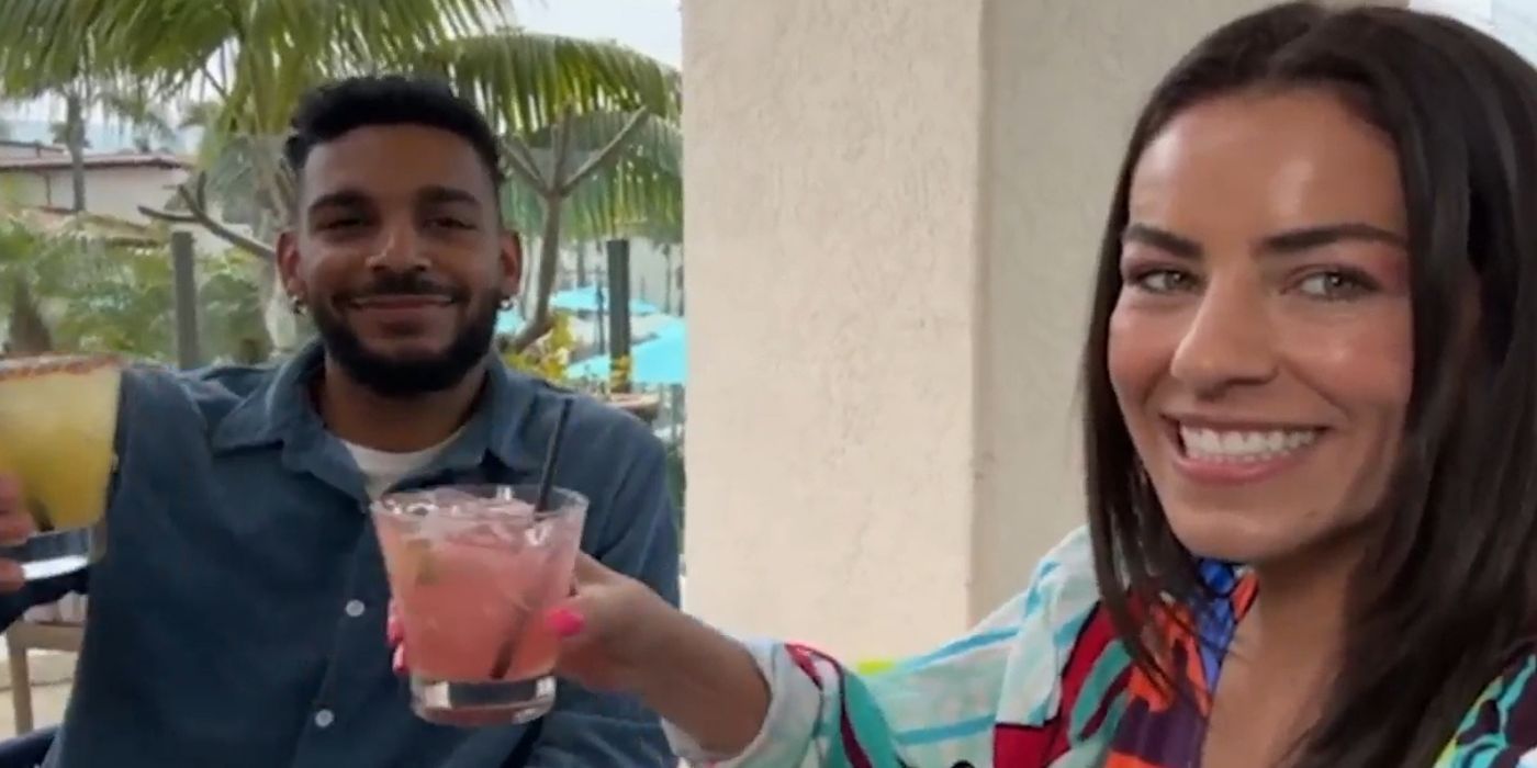 90 Day Fiance Jamal Menzies and Veronica Rodriguez clinking cocktail glasses and smiling