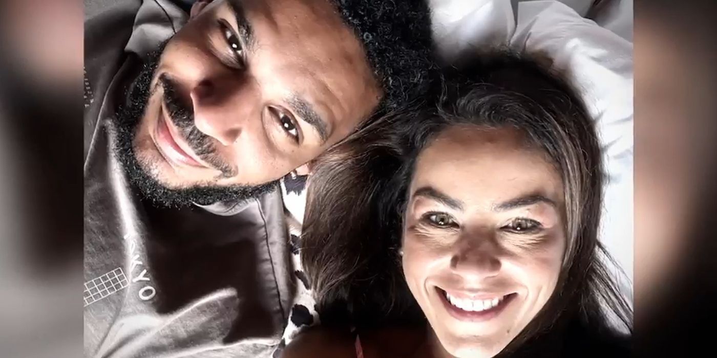 90 Day Fiance Jamal Menzies and Veronica Rodriguez lying down and taking selfie from top angle