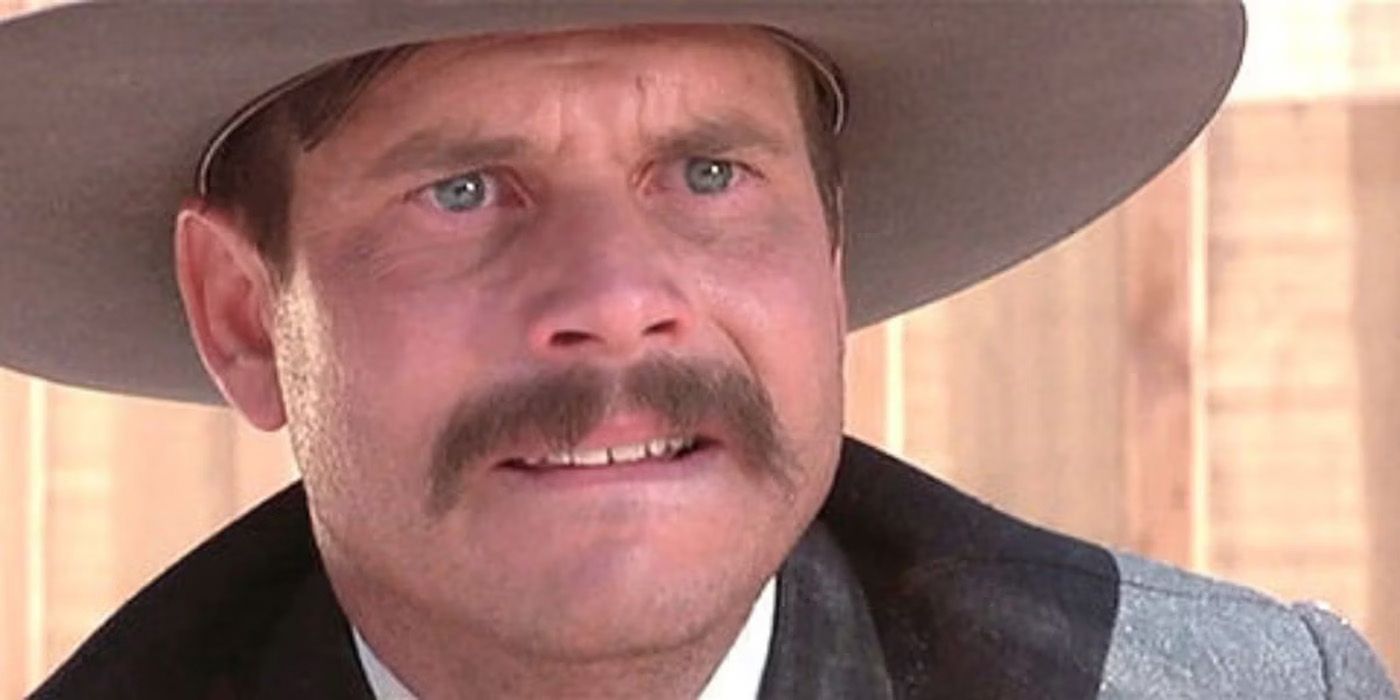 A distressed Morgan Earp looks up