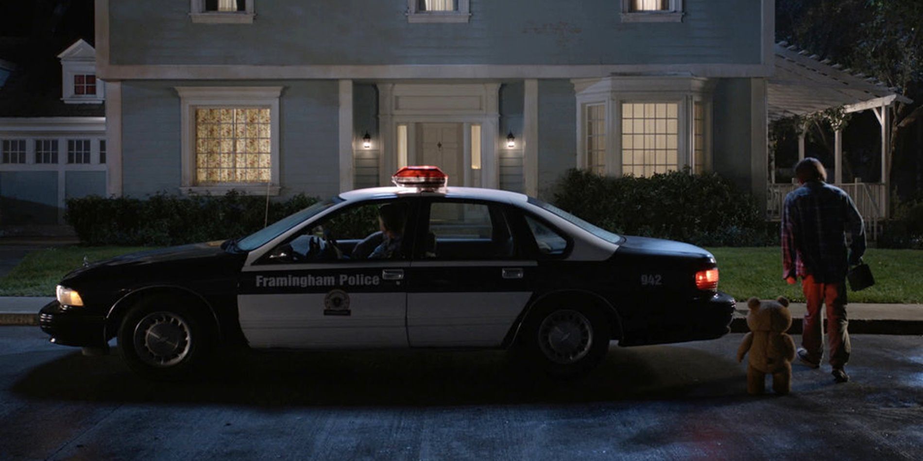 A police car drops off Ted and John in Ted