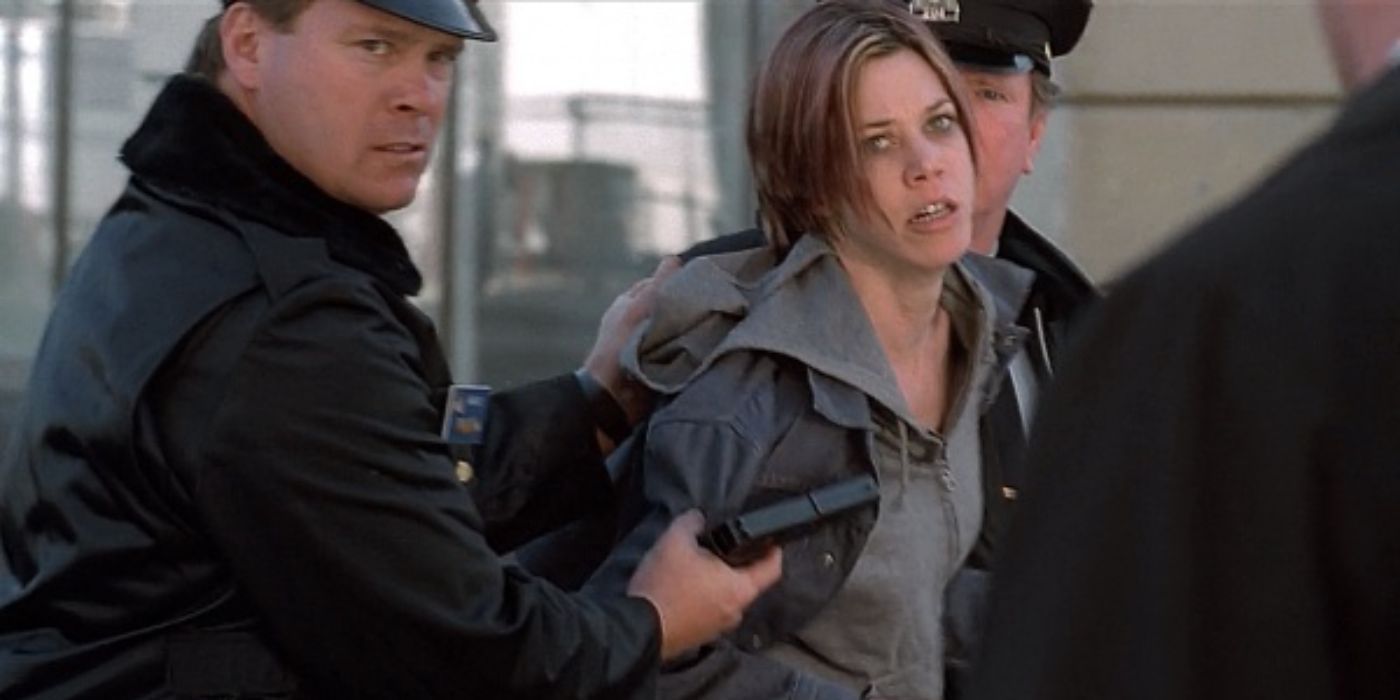 A woman being arrested in The X-Files