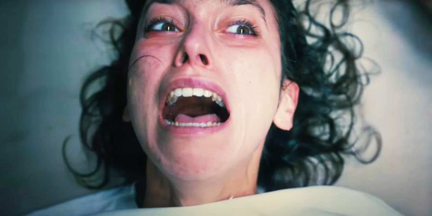 A woman screaming in distress in The First Omen.