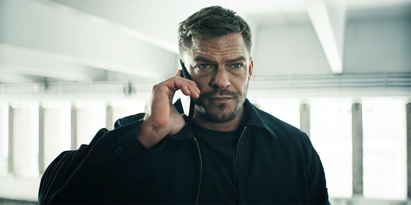 Alan Ritchson as Jack Reacher talking on the phone in Reacher season 2, episode 7