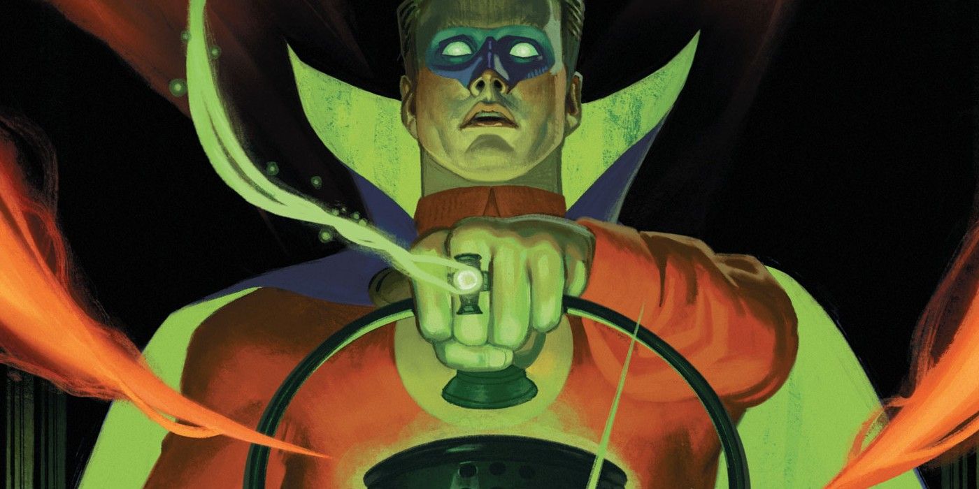 Image of Alan Scott holding his Lantern while a green light comes out of his ring.