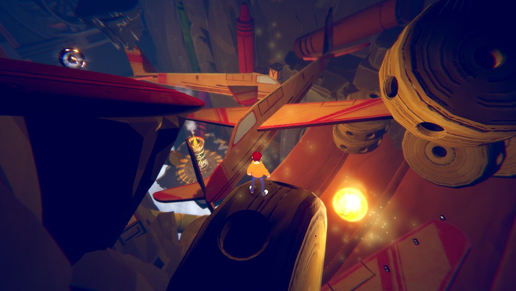 Always In Mind Teddying sranding on a wheel in the toy room looking down at model planes.