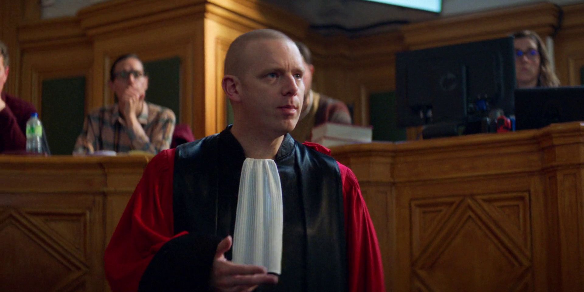 Antoine Reinartz as the prosecutor in court in Anatomy of a Fall.