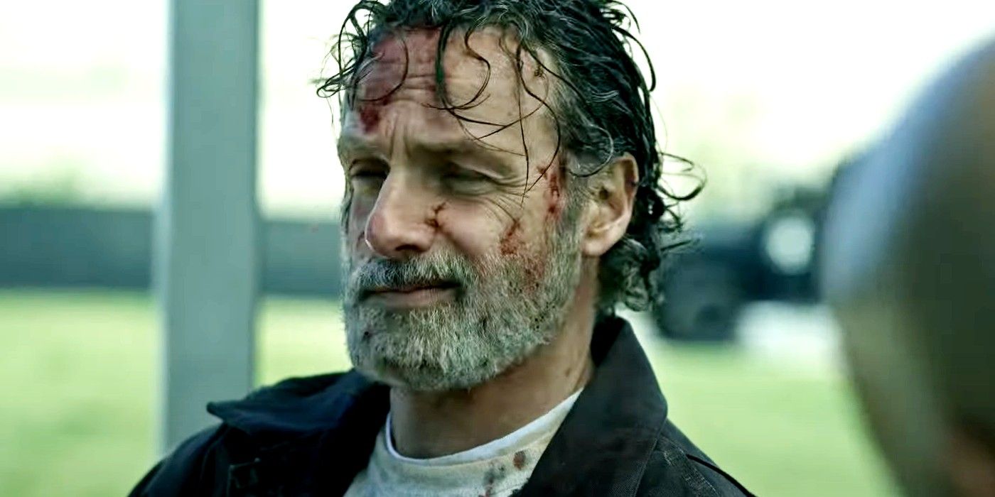 Andrew Lincoln as Rick Grimes smirking in The Walking Dead: The Ones Who Live