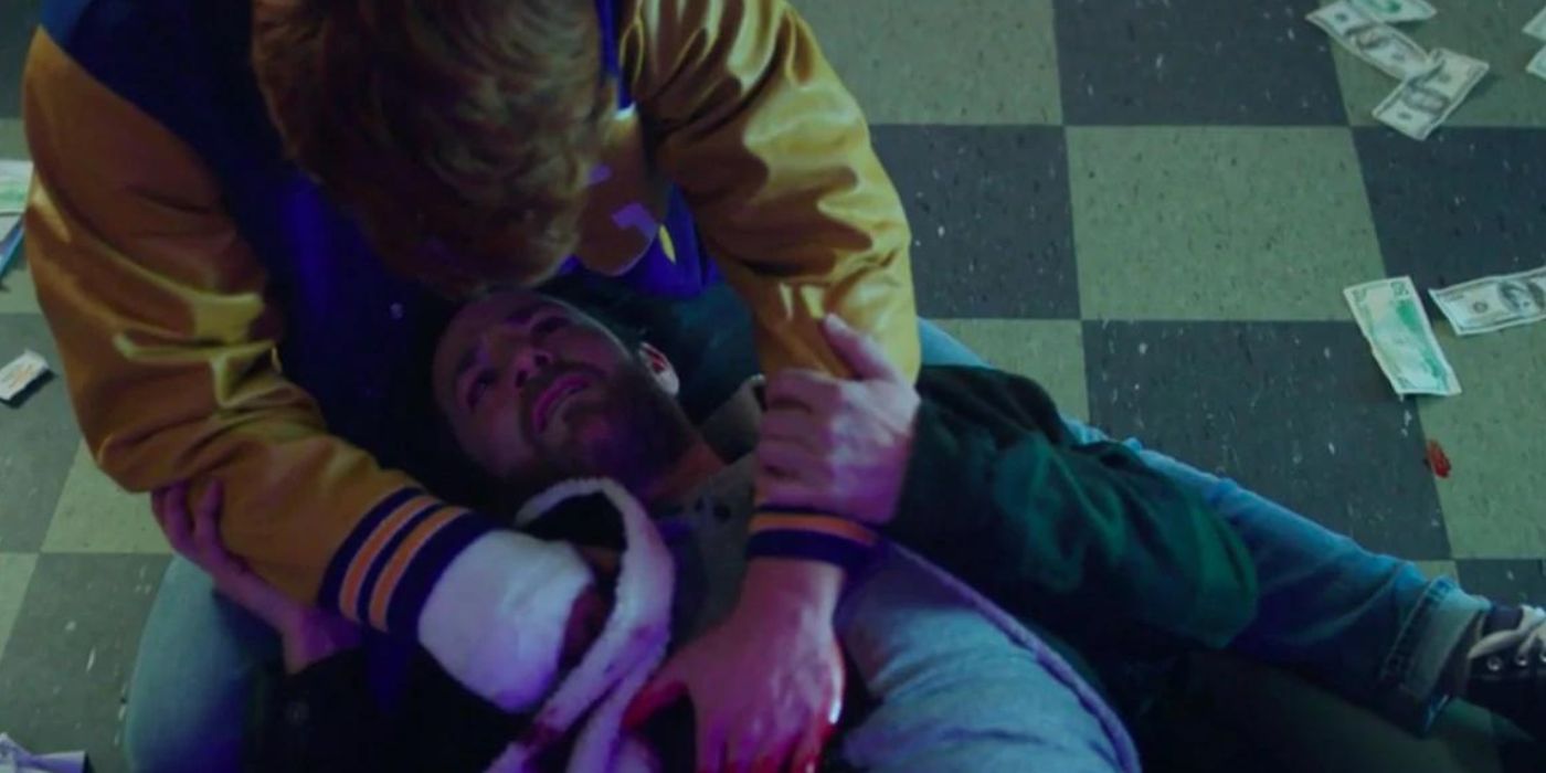 Archie holds his father after Fred is shot in Pops in Riverdale season 1 finale