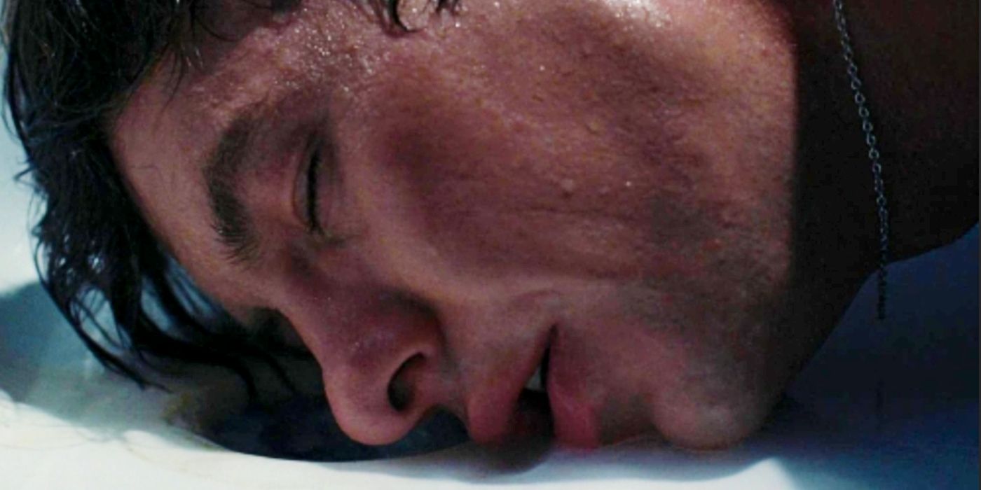 Barry Keoghan with his face on the bottom of a bathtub as Oliver in Saltburn