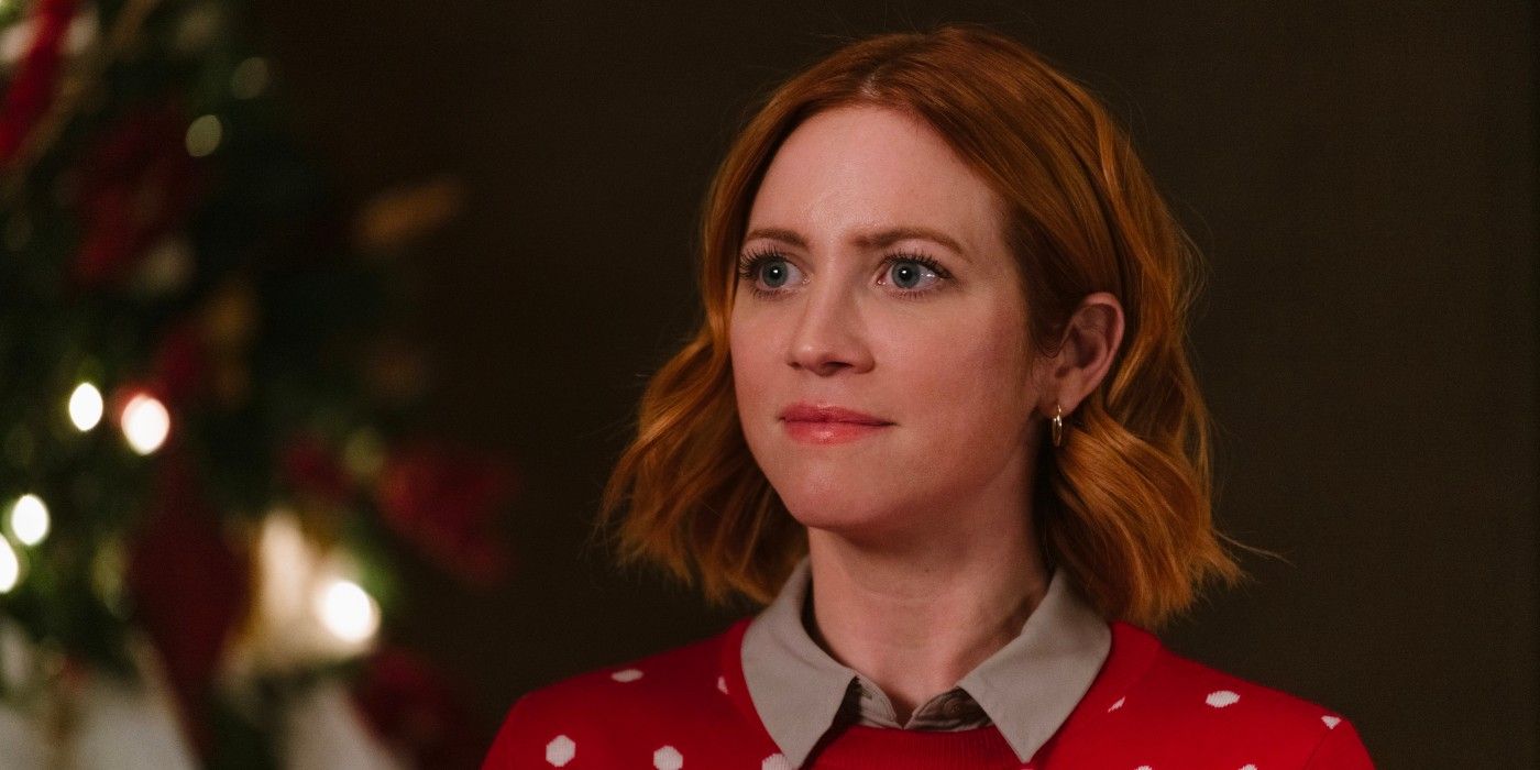 Brittany Snow looks on stoically in Christmas with the Campbells