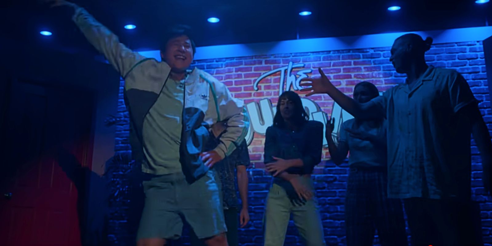 Bruce dances on stage during his improv show in The Brothers Sun.