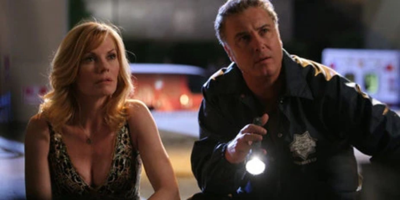 Gil Grissom and Catherine Willows with a flashlight in CSI.