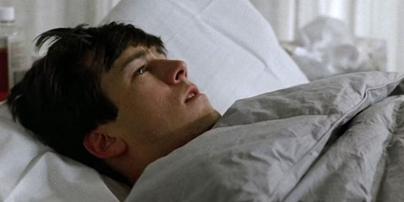 Cameron lying in bed in Ferris Bueller's Day Off.