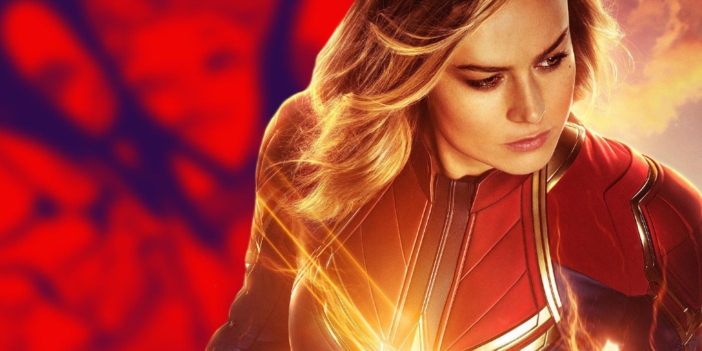 CAPTAIN MARVEL MCU IN FOREGROUND AS COMIC VERSION EXPLODES IN BACKGROUND