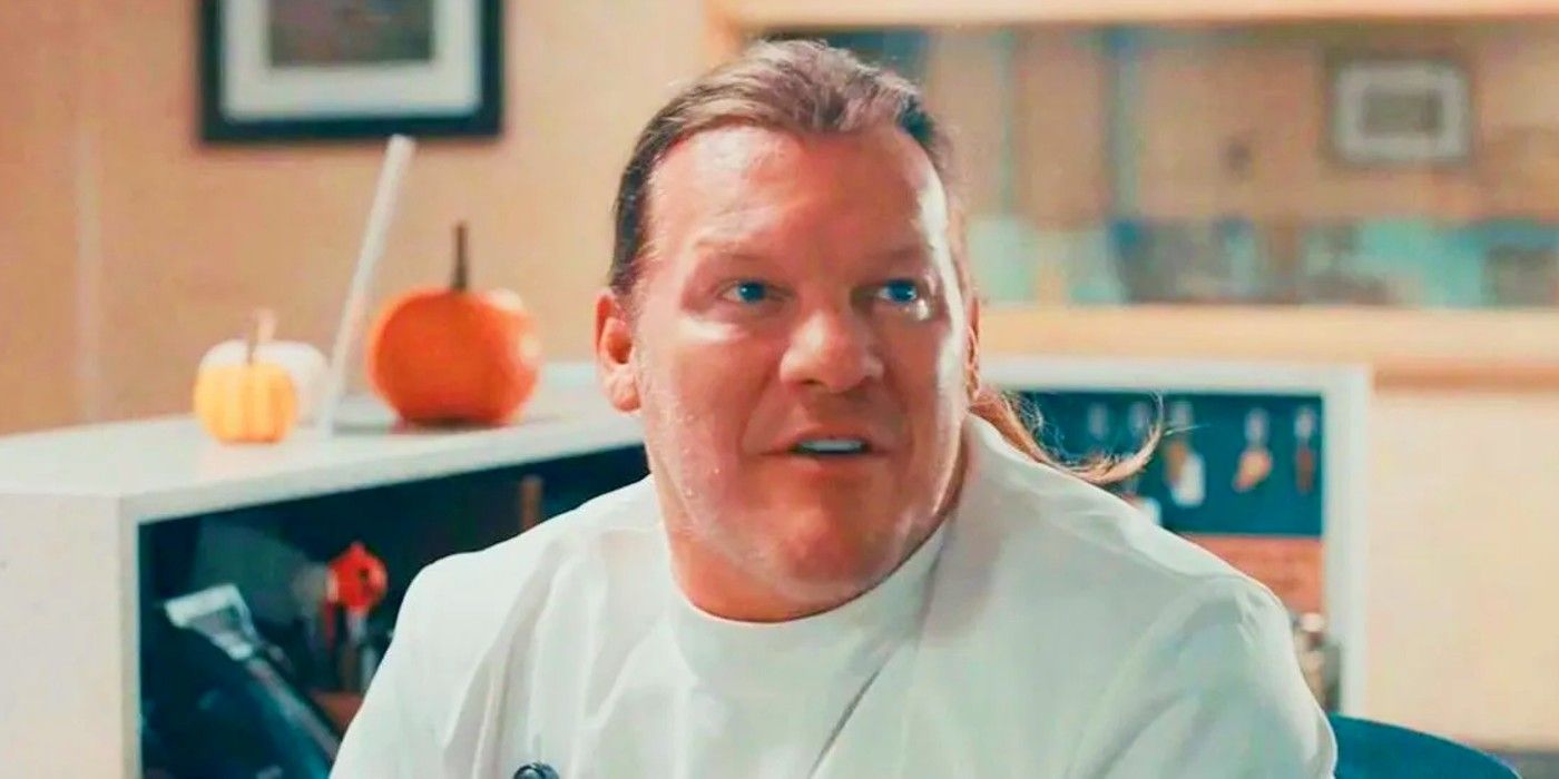 Chris Jericho as Burke looking at and talking to someone off camera in Terrifier 2