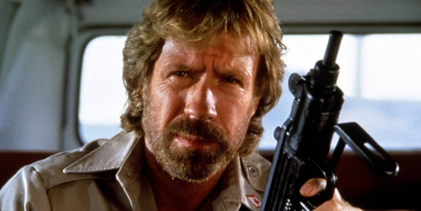 Chuck Norris holding Uzi in The Delta Force