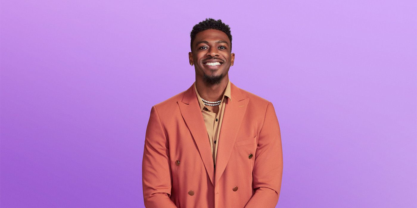 Clay Love Is Blind Season 6 in orange button down for promo pic