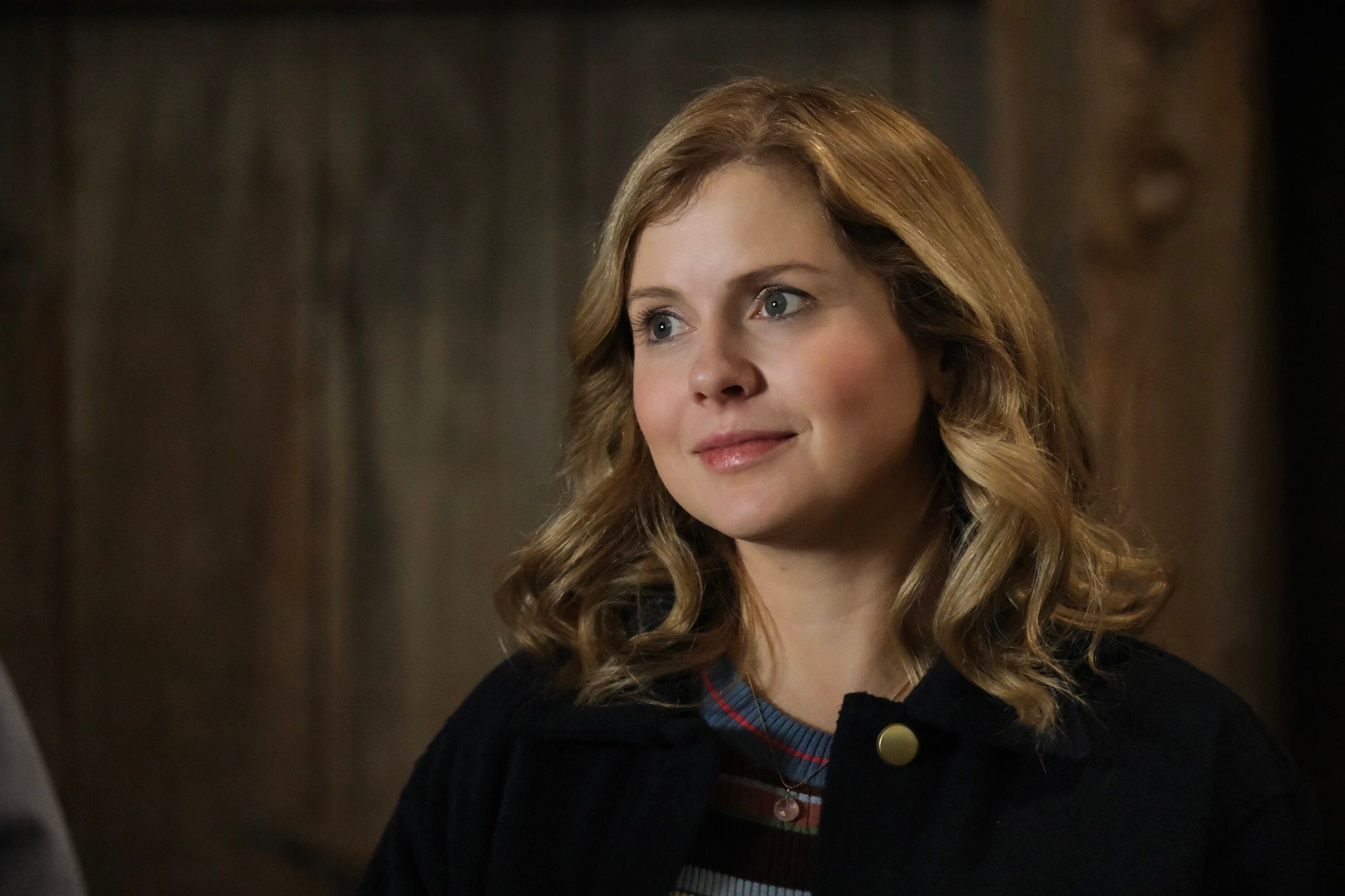 Close up of Rose McIver looking to the left in Ghosts season 3