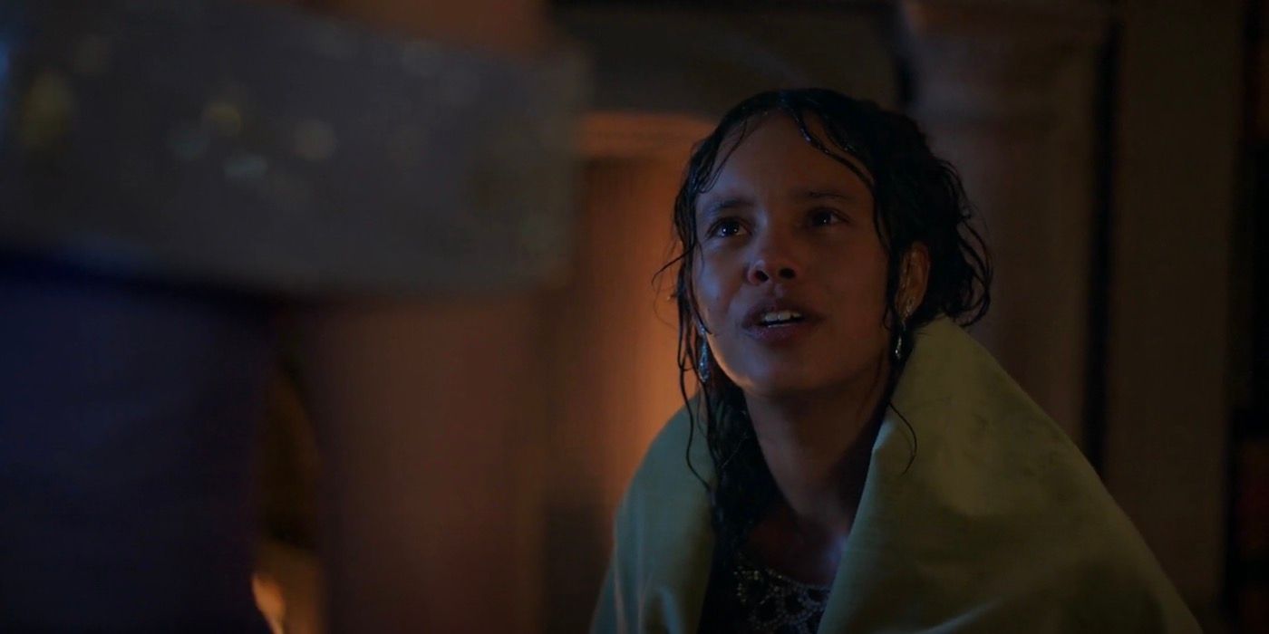 Conchita with wet hair, wrapped in blanket