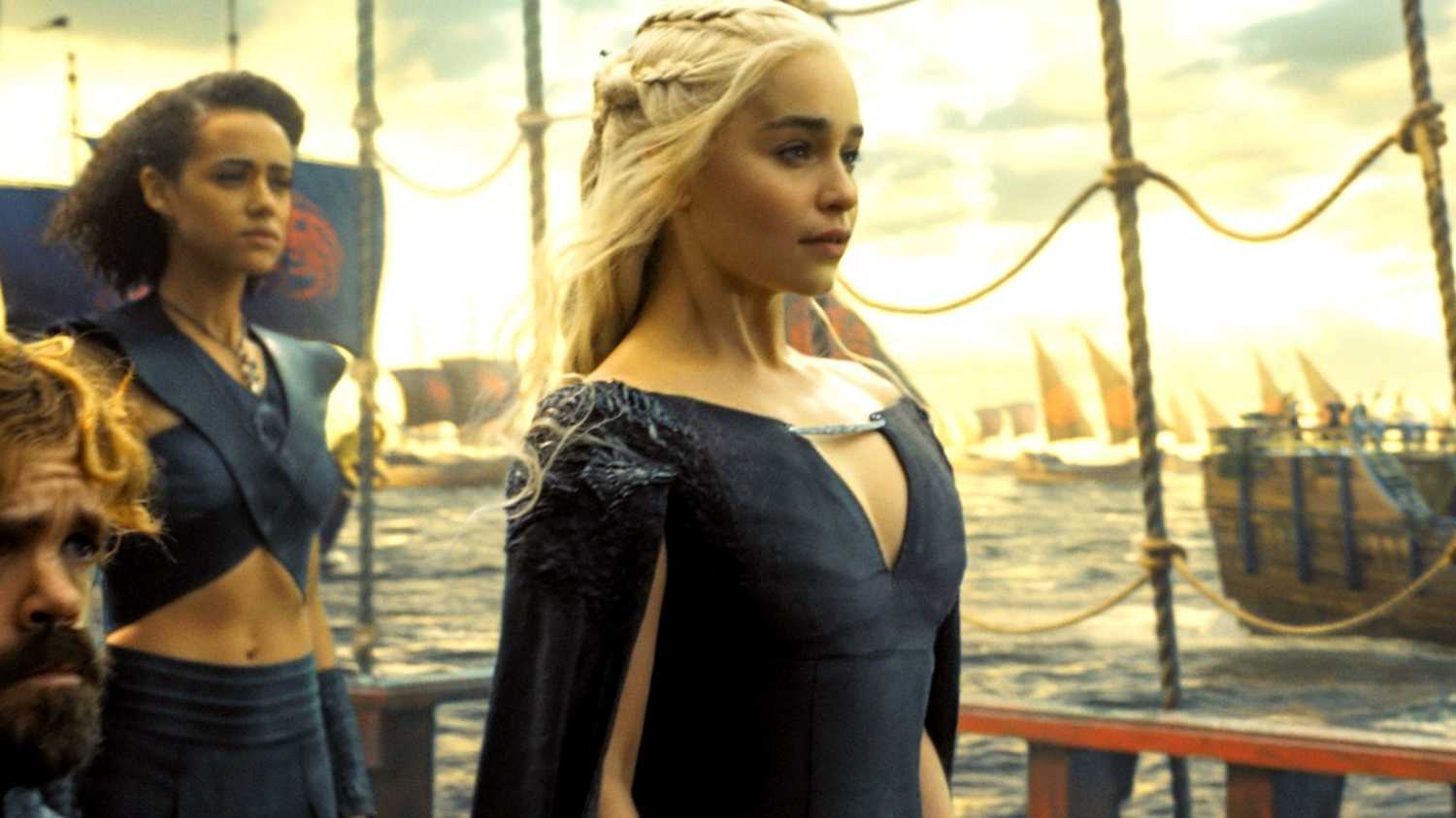 Daenerys stands on a ship with Missendai and Tyrion as she sails for Westeros