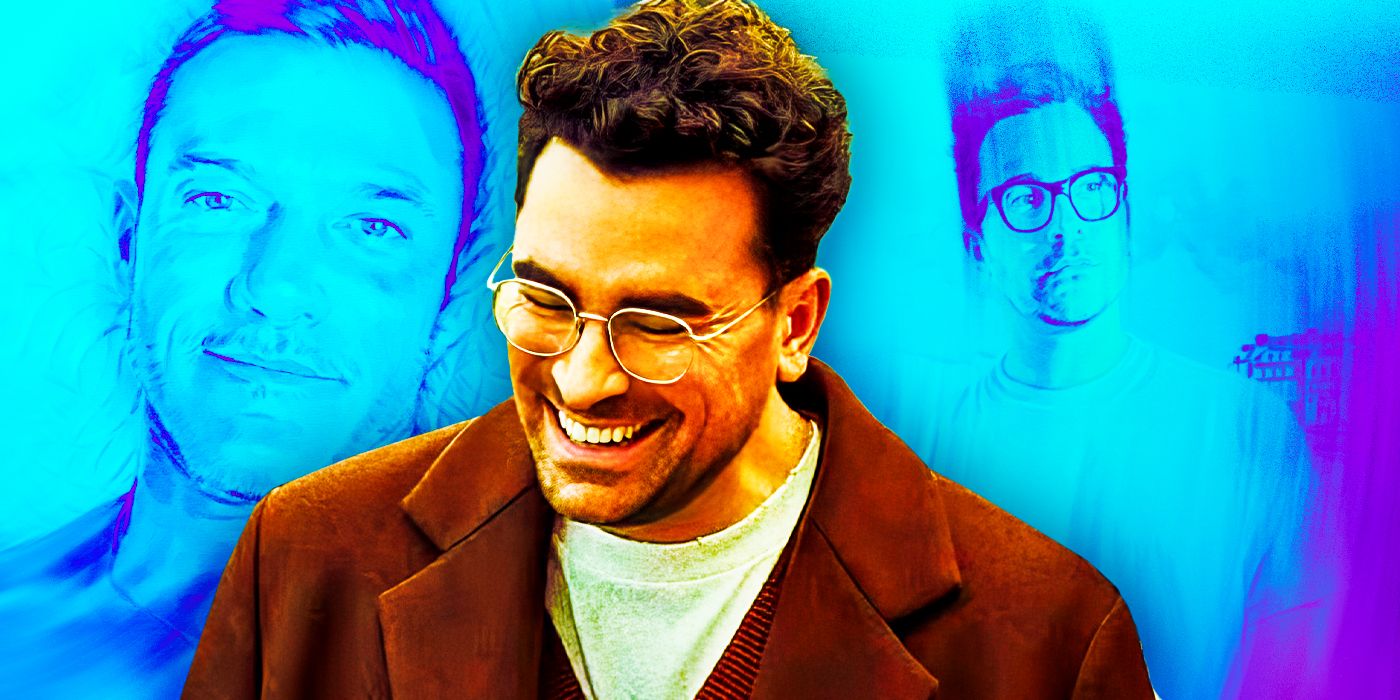 Dan Levy as Marc surrounded by his paintings in Good Grief