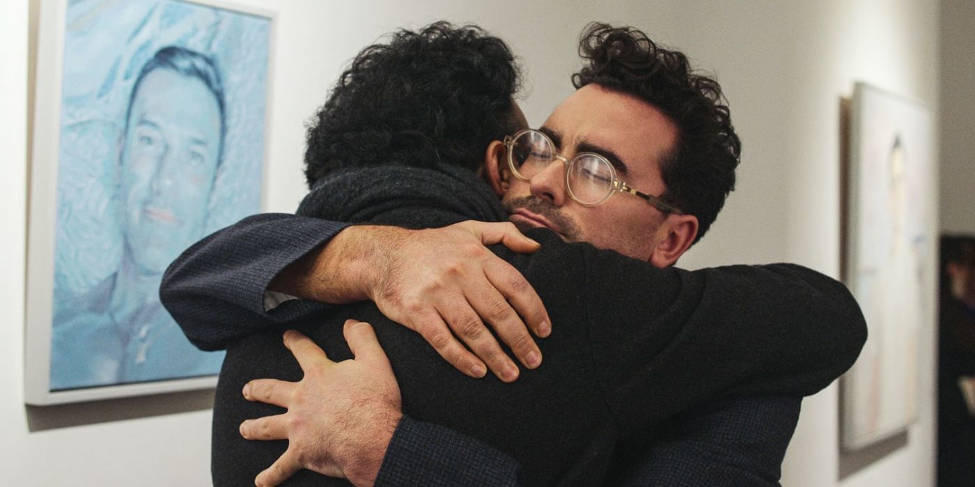 Dan Levy as Marc hugging his friend in Good Grief