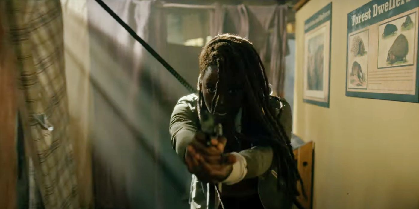 Danai Gurira holding a gun as Michonne in The Walking Dead: The Ones Who Live