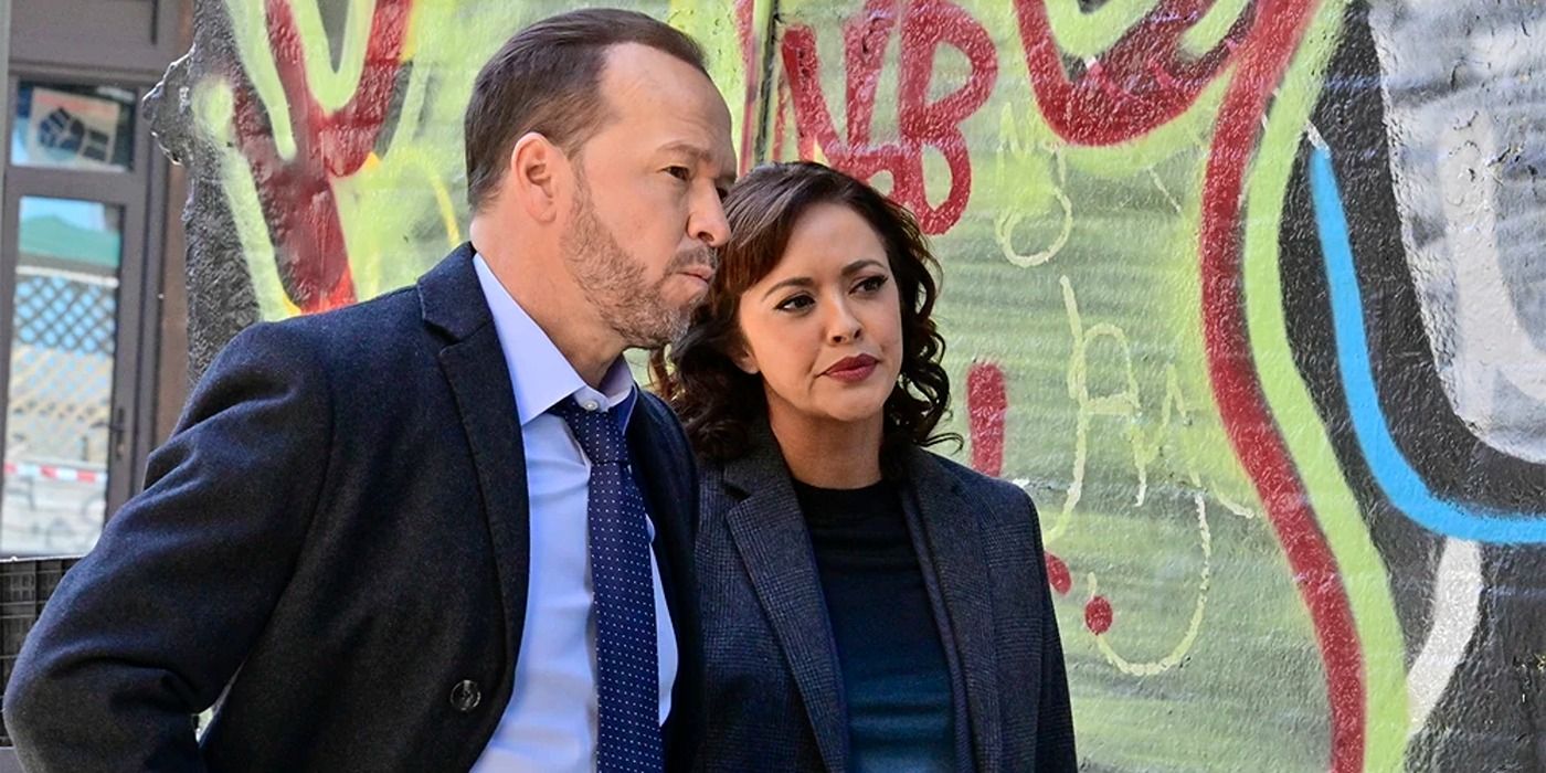 Danny and Baez in Blue Bloods next to graffiti wall