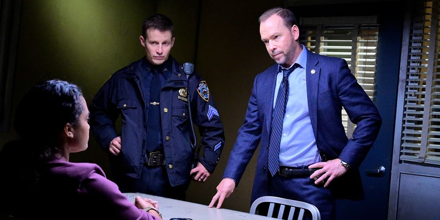 Danny (Donnie Wahlberg) and Jamie Reagan (Will Estes) interview a suspect in Blue Bloods