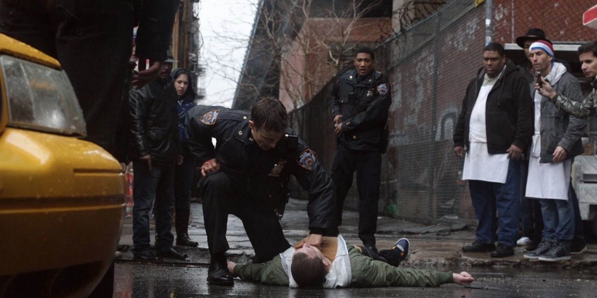Danny (Donny Wahlberg) checks pulse of a body in Blue Bloods